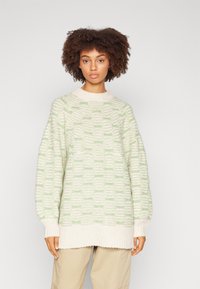 Object OBJINA TUNIC - Striktrøje - sandshell/fair green