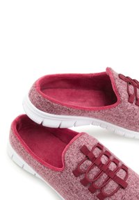 Textured, wool-like maroon slip-on shoes with a soft interior, white rubber sole, and elastic lace accents.