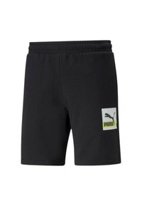 Pantaloni corti neri realizzati in tessuto morbido, con una vita elastica, tasche laterali e una patch con il logo Puma bianco e verde neon sulla parte anteriore.