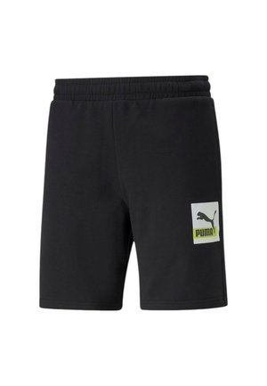 Pantaloni corti neri realizzati in tessuto morbido, con una vita elastica, tasche laterali e una patch con il logo Puma bianco e verde neon sulla parte anteriore.