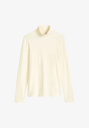 Haut à manches longues en jersey doux couleur ivoire. Doté d'un col montant et d'une coupe décontractée avec des manches longues. Texture lisse, sans motifs.