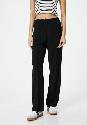 Koton ELASTIC WAIST - Tygbyxor - black