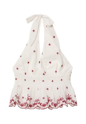 Weißes Haltop mit roter Blumenstickerei, geraffter Taille und gewelltem Saum. Aus leichtem Stoff gefertigt, mit Halsbändern.