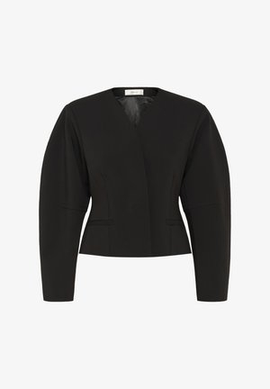 Musta lyhyt bleiseri, jossa pitkät hihat, muotoillut olkapäät ja hillitty V-pääntie, edessä kaksi pientä taskua.