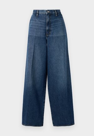 Wide-leg denim jeans in dark blue. Features a high waist, zipper fly, and subtle fading. Constructed from textured cotton fabric.