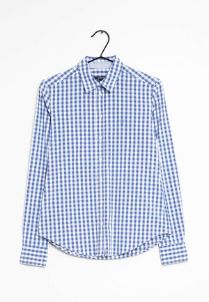 Chemise boutonnée à manches longues en vichy bleu et blanc avec un col classique et un ourlet arrondi, fabriquée en tissu léger.
