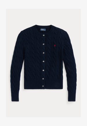 Navy blue cable-knit cardigan with a round neckline, six buttons, and ribbed cuffs and hem. Features a small red logo on the chest.