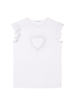 Biała koszulka z krótkim rękawem, ozdobiona falbaniastymi koronkowymi wstawkami oraz wzorem serca utworzonym z małych kropek na środku. Miękki, gładki materiał.