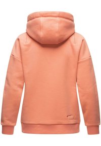 Hooded sweatshirt in soft coral fabric. Features a relaxed fit, ribbed cuffs and hem, with a small logo patch on the lower left side.