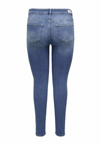Vaqueros ajustados en denim azul medio. Cuenta con dos bolsillos traseros y una cintura con pasadores para cintur�ón. Textura suave, sin patrones prominentes.