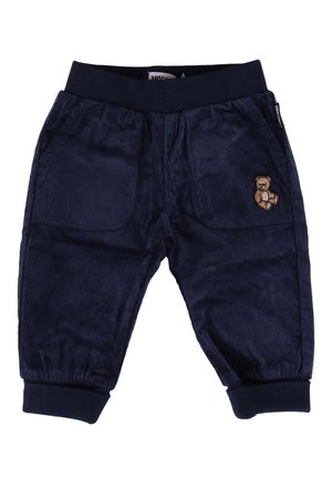 Pantaloni in corduroy blu navy per bambini, con vita e polsini elasticizzati, tasche frontali e un piccolo patch di un orsetto sulla tasca destra.
