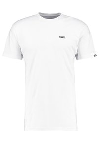 Valkoinen puuvillainen t-paita, jossa on lyhyet hihat ja pyöreä pääntie. Rinnassa pieni musta "VANS"-logo ja hihassa koristeena merkki.