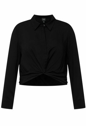 Maglietta corta nera con colletto a punta, maniche lunghe e dettaglio anteriore arrotolato. Realizzata in un tessuto liscio con una silhouette aderente.