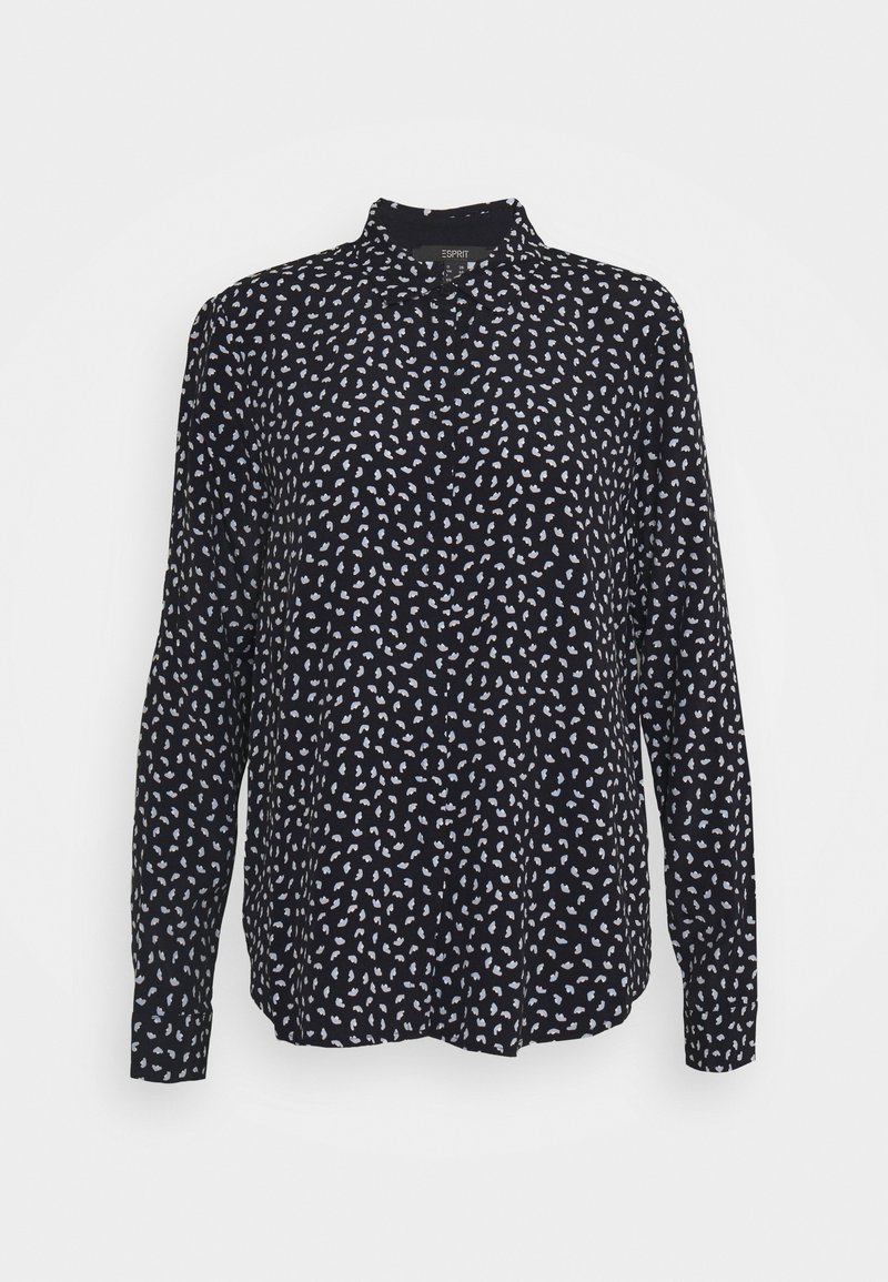 Chemise noire avec col, manches longues et motif blanc éparpillé. Fabriquée en tissu lisse, avec fermeture à boutons sur le devant et coupe décontractée.