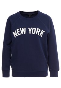 Felpa blu navy con testo bianco "NEW YORK", scollo rotondo, maniche raglan e polsini e orlo a costine. Realizzata in morbido cotone.
