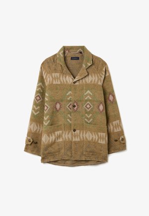 Brown patterned jacket with geometric designs in cream and green, featuring a collar, buttons, and two front pockets. Soft texture.