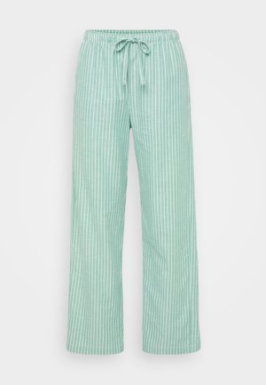 Vihreä raidallinen housut, joissa on joustava vyötärö ja naru. Löysä malli, suorat lahkeet ja pehmeää puuvillakangasta.