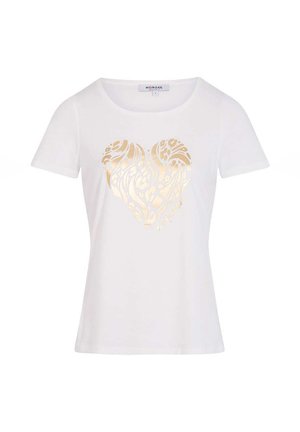 T-shirt bianca a maniche corte con un design astratto a forma di cuore dorato al centro davanti e scollo rotondo.