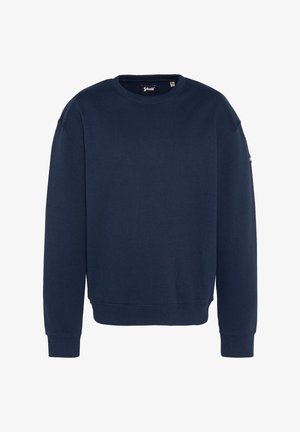 Sudadera azul marino hecha de una suave mezcla de algodón. Presenta un cuello redondo, mangas largas, puños acanalados y un diseño minimalista.