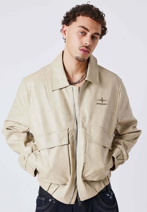 URBAIN ZIPPÉ - Chaqueta de cuero sintético - greige