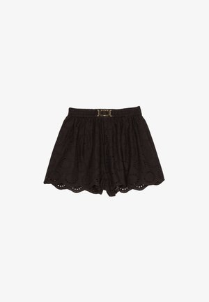 Pantaloni corti neri in cotone con un design testurizzato caratterizzato da ritagli circolari, una vita elasticizzata e una fibbia decorativa dorata frontale.