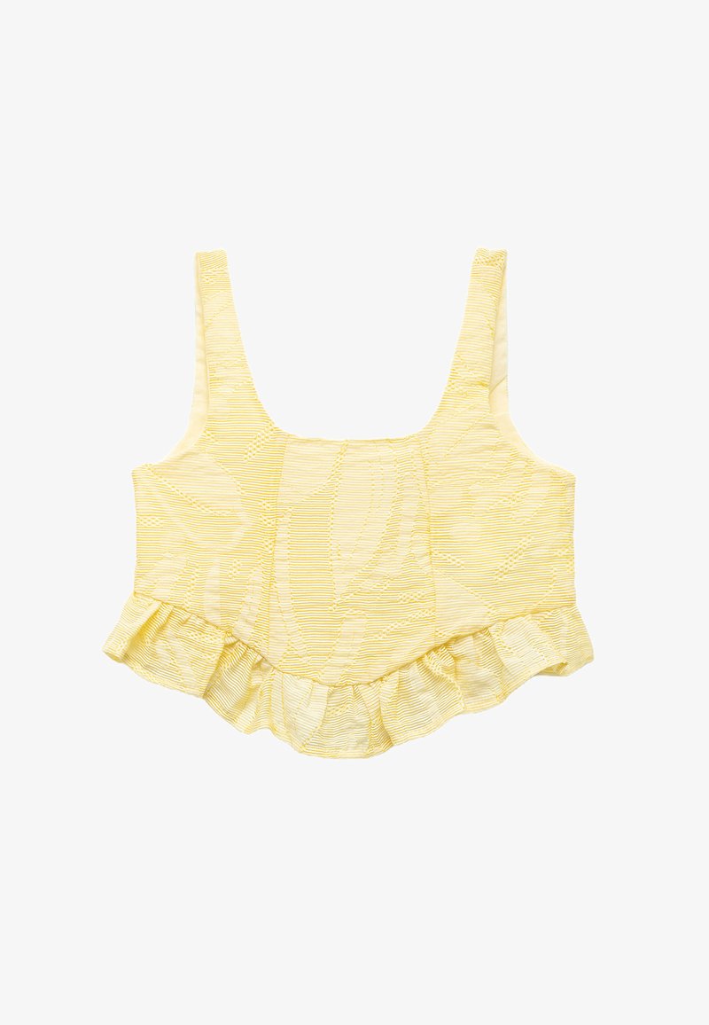 Żółty crop top z teksturowanym wzorem, z falbaną na dolnej krawędzi i szerokimi ramiączkami. Wykonany z lekkiego materiału z subtelnymi wzorami.