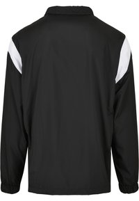 Starter Cortaviento - black