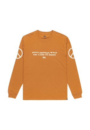 Long-sleeve orange shirt featuring white text "DON'T DESTROY WHAT YOU CAME TO ENJOY" and a peace sign graphic on the left sleeve.