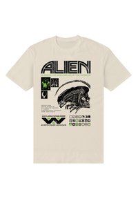 Jasnobeżowy t-shirt z czarno-zielonym nadrukiem graficznym, zawierający słowo "ALIEN" oraz różne obrazy związane z motywem science fiction.