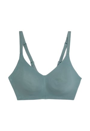Light teal seamless bra with adjustable straps, v-neck design, and soft texture. No underwire, featuring a smooth finish and minimalist style.