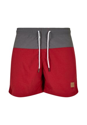 Bañador rojo y gris con una tela texturizada, cintura elástica con cordón y un pequeño parche de la marca en forma rectangular.