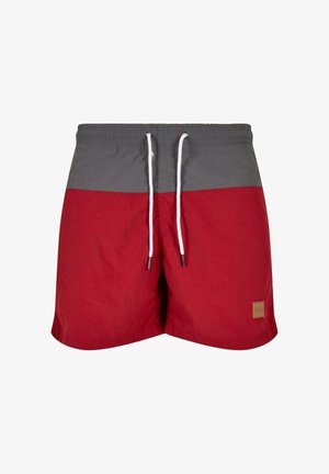 Rode en grijze zwembroek met een gestructureerde stof, een elastische tailleband met trekkoord en een klein rechthoekig merkembleem.