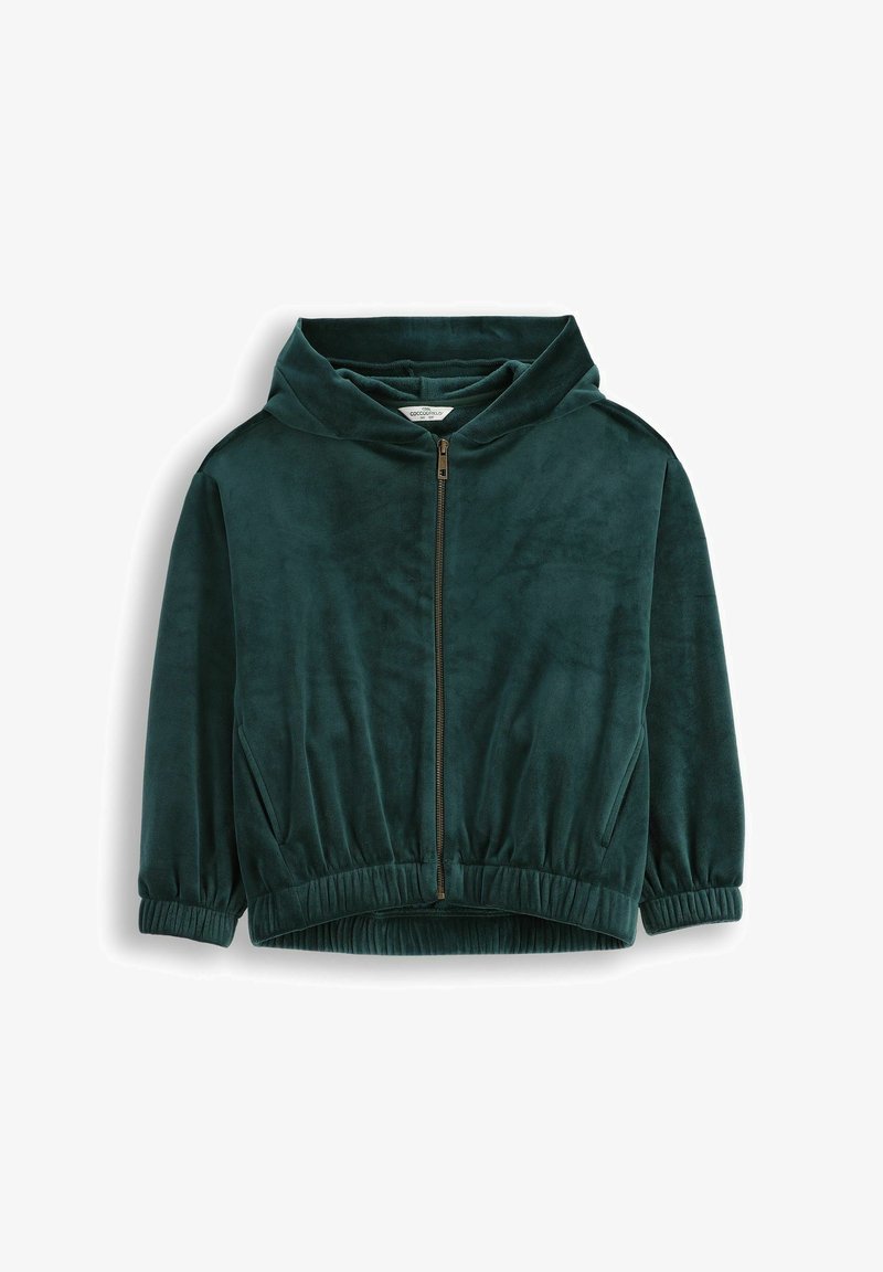 Zielona welurowa bluza zapinana na zamek z wysokim kołnierzem, elastycznym pasem i bocznymi kieszeniami. Miękka tekstura, długie rękawy i dopasowany krój.