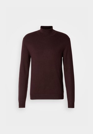 Suéter de cuello alto burdeos en un tejido de punto suave, con mangas largas, cuerpo ajustado y puños y dobladillo acanalados. Textura suave, diseño minimalista.