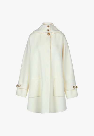 Cream-colored wool coat with high collar and wooden buttons, featuring large front pockets and buttoned cuffs.