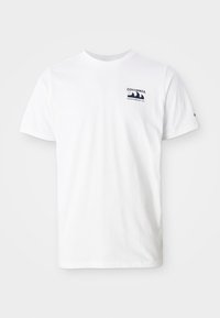 White cotton t-shirt with short sleeves. Features a navy logo on the left chest. Simple crew neck design, smooth texture.