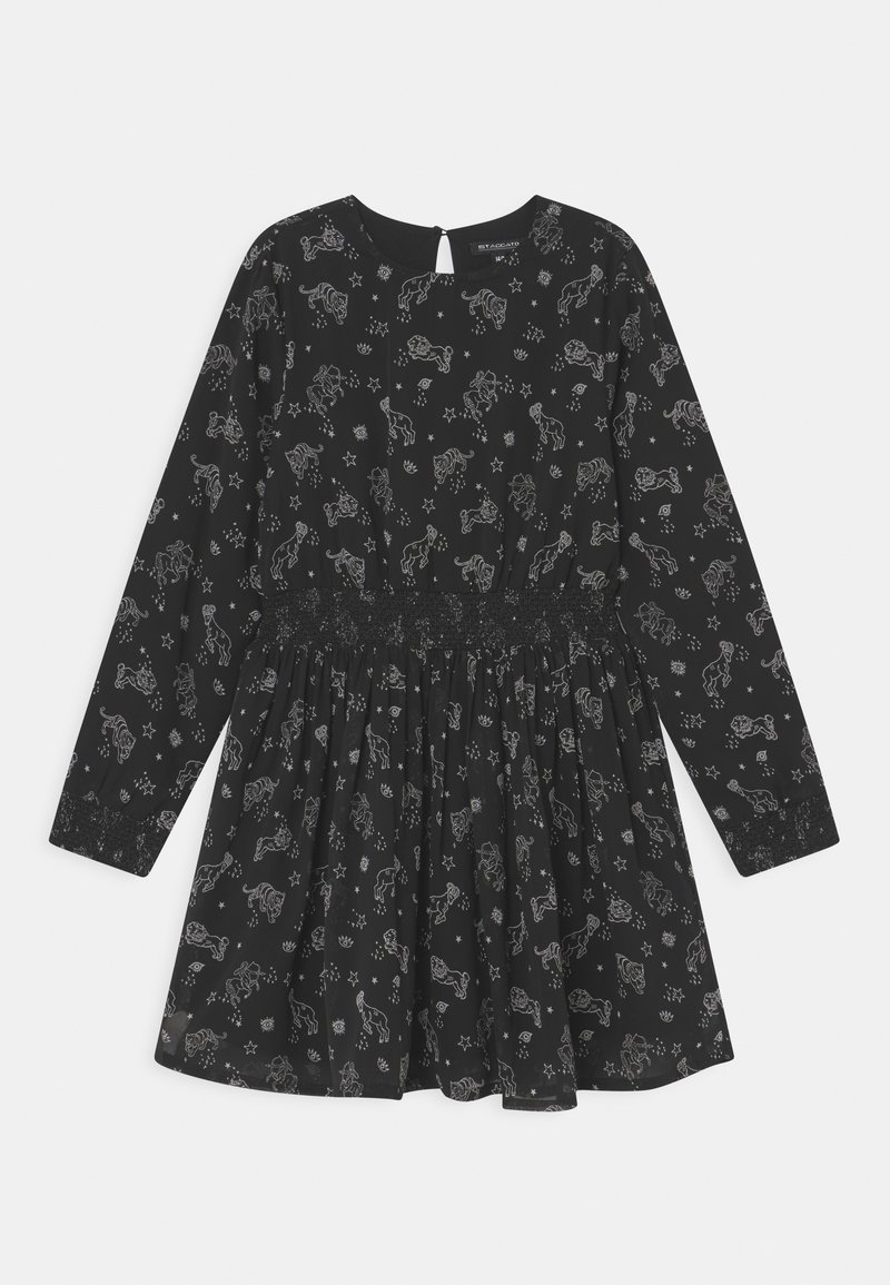 Robe noire à manches longues avec taille élastique, présentant des imprimés blancs de constellations de chevaux, d'étoiles, d'yeux et de soleils sur tout le tissu.