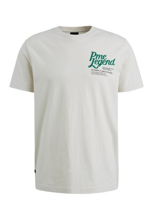 Bawełnka damska koszulka z okrągłym dekoltem w kolorze off-white z zielonym tekstem i grafiką. Krótkie rękawy, luźny krój oraz metka na dolnej lewej stronie.