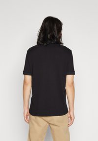 Armani Exchange Polo shirt - black
