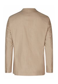 Veste beige ajustée au design épuré et simple. Comprend des manches longues et des accents à trois boutons sur les poignets. Texture lisse, sans motifs.