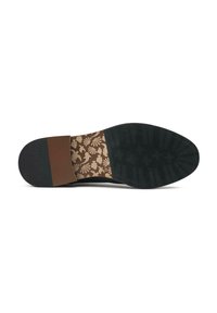 Black shoe sole with a textured surface. Features a brown accent section and a floral pattern in gold on the inner part of the sole.
