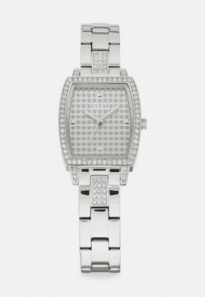Orologio in acciaio inossidabile argentato con quadrante rettangolare, decorato con cristalli e fondo texturizzato. Presenta un design con bracciale a maglie.