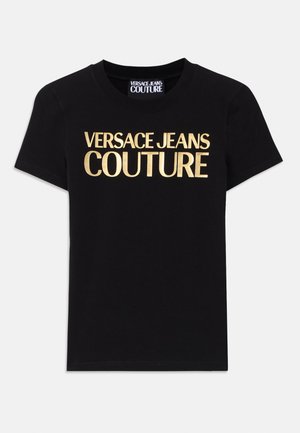 Black cotton t-shirt featuring "VERSACE JEANS COUTURE" in large gold lettering on the front, short sleeves and a crew neckline.