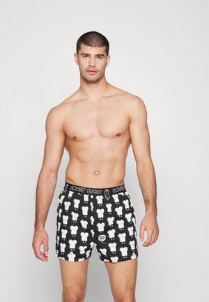 Schwarze Boxershorts mit weißen Comicfiguren, ausgestattet mit einem Bund, der "LOUSY LVN" beschriftet ist. Baumwollmaterial, lockerer Schnitt, lässiges Design.