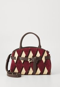 Red and cream handbag with a quilted diamond design, constructed from suede and leather. Features a brown strap and gold-toned hardware.