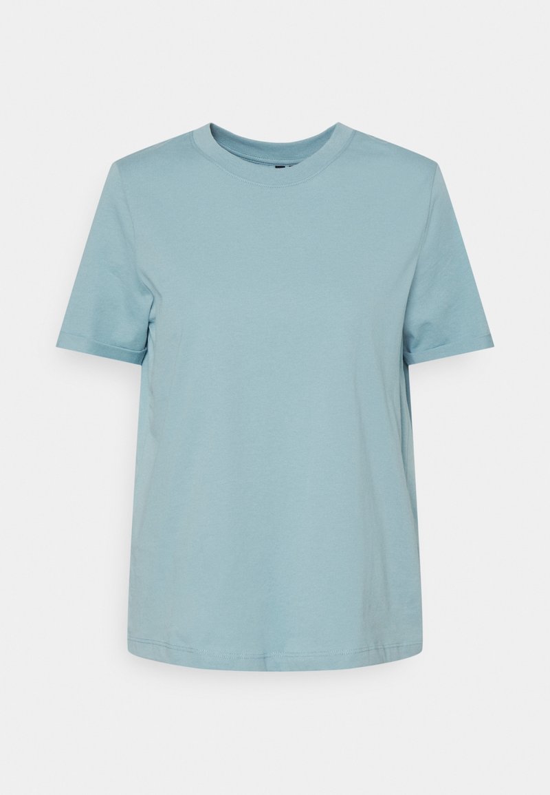 Ljusblå bomullströja med korta ärmar, rund halsringning och avslappnad passform. Slät textur, fållen slutar vid höften.