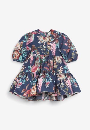Robe pour tout-petit bleu marine à manches bouffantes et imprimé floral multicolore, avec jupe à volants superposés et encolure ronde.