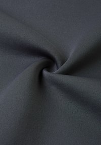 Dark gray, smooth fabric with a slight sheen, featuring a fine ribbed texture and a soft, flowing quality. Ideal for various textile applications.