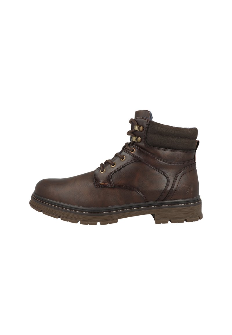 Botines de cuero marrón con punta redonda, cuello acolchado de un marrón oscuro, ojales metálicos y suela de goma resistente.