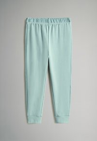 Šviesiai mėlyni sportiniai šortai su minkšta tekstūra, elastinga juostos juosta ir siaurėjančiomis rankovėmis. Lygi medžiaga, minimalistinis dizainas, be raštų ar akcentų.